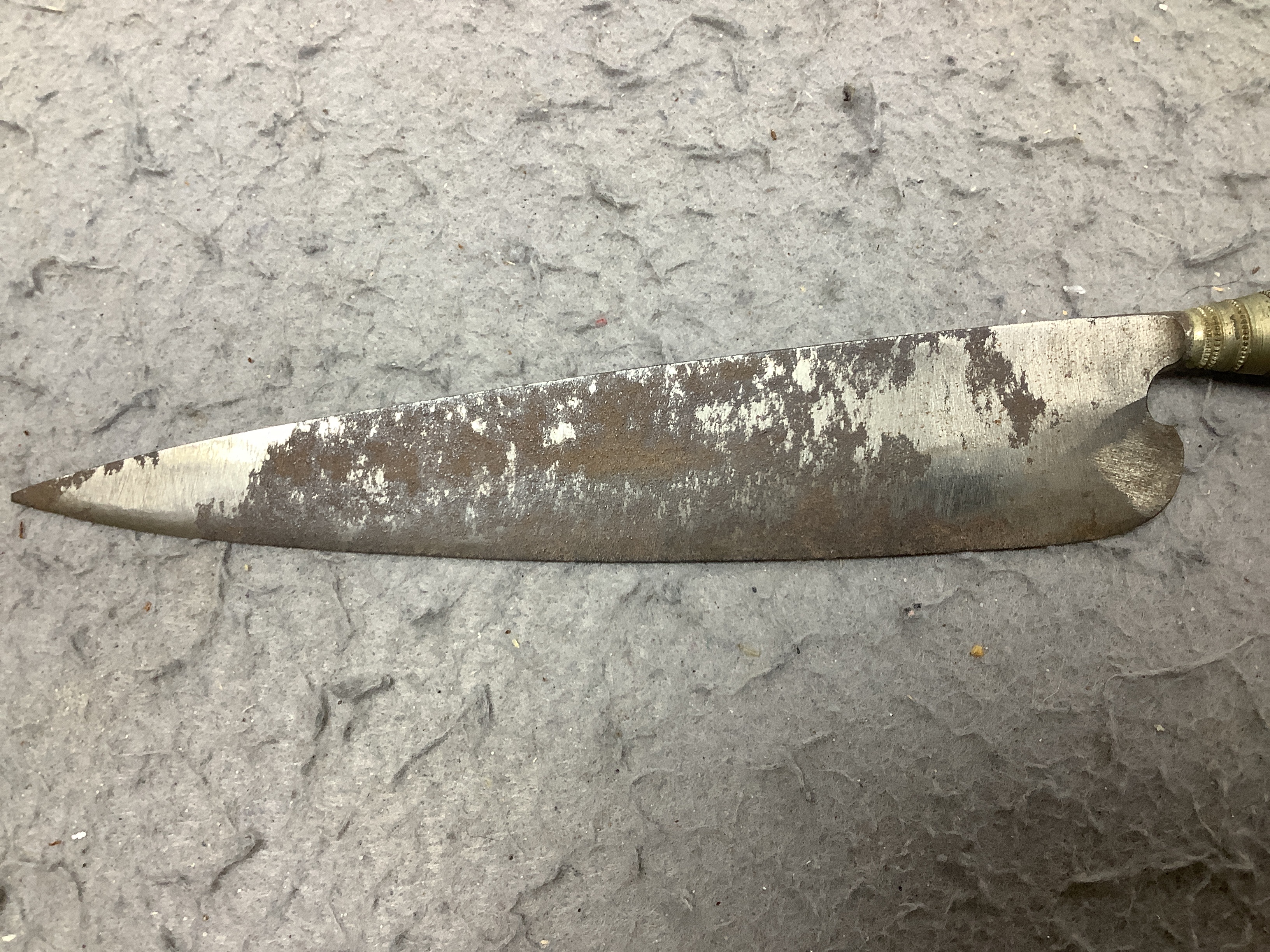 A 19th century Japanese katana with signature to the tang, with chiselled bronze tsuba and gilt metal menuki, and six various knives, blade 57cm